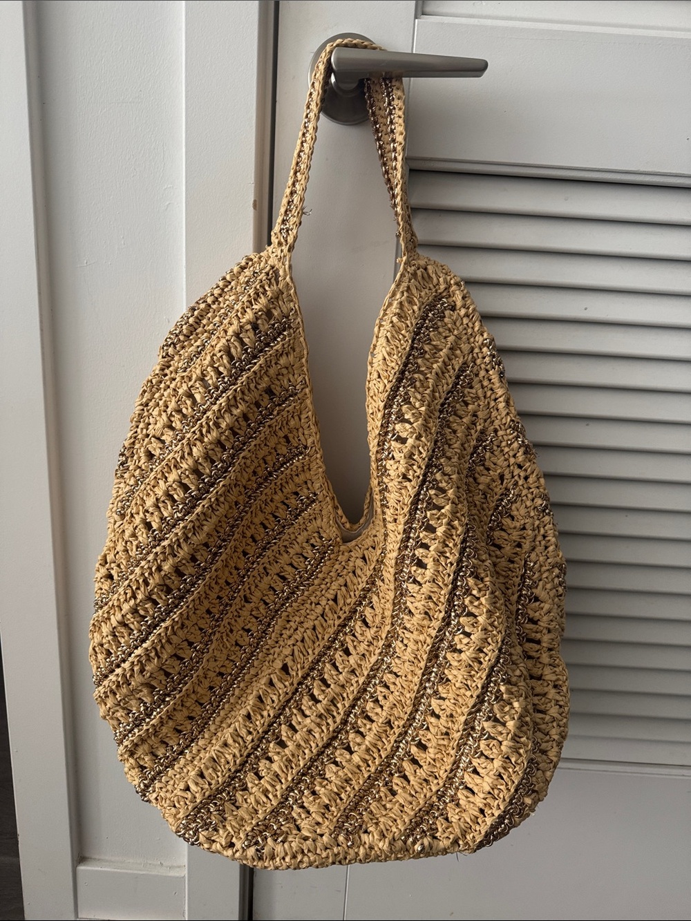 Roomy Raffia tote with lined interior.